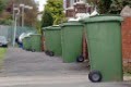 Taking your wheelie bin out service on bin collection day Wheelie Bins been taking out